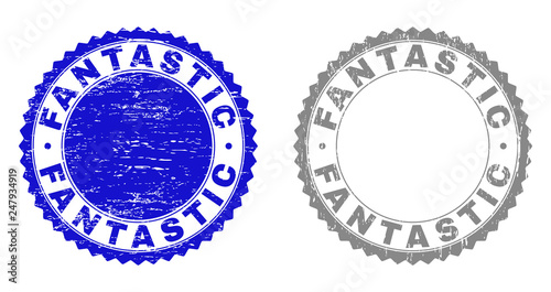 Grunge FANTASTIC stamp seals isolated on a white background. Rosette seals with distress texture in blue and gray colors. Vector rubber stamp imprint of FANTASTIC tag inside round rosette.