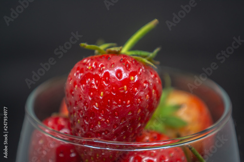 Red strawberry fruit for fresh food or a food ingredient can see at many markets or supermarket in Thailand 