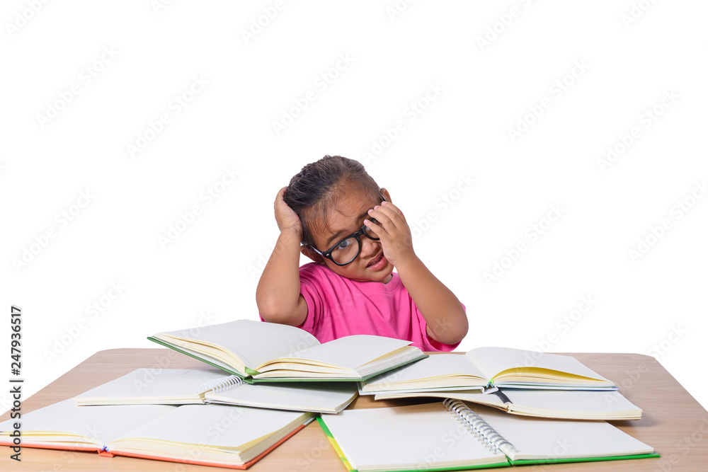 little girl with glasses thought and many book on the table. back to school concept, isolated on white background little girl with glasses thought and many book on the table. back to school concept, isolated on white background