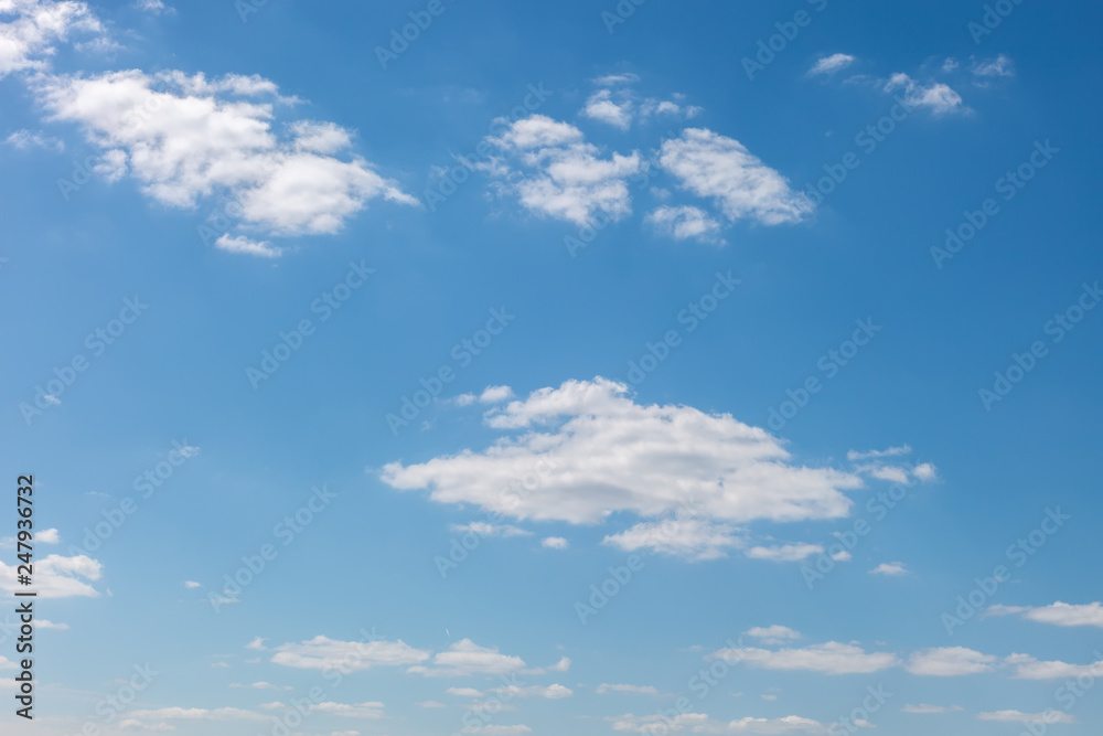 Blue sky with white clouds as a background Blue sky with white clouds as a background