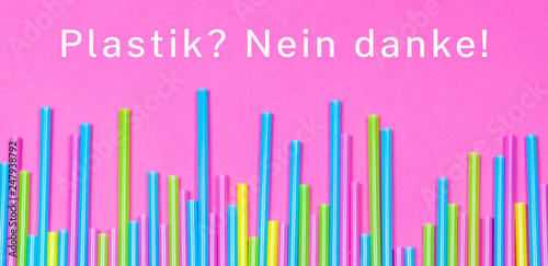 Banner of colorful plastic straws with the German words for Plastic  No thanks  on pink
