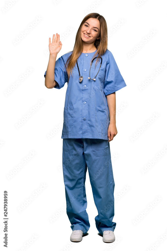 Full body Young nurse saluting with hand with happy expression on isolated background Full body Young nurse saluting with hand with happy expression on isolated background