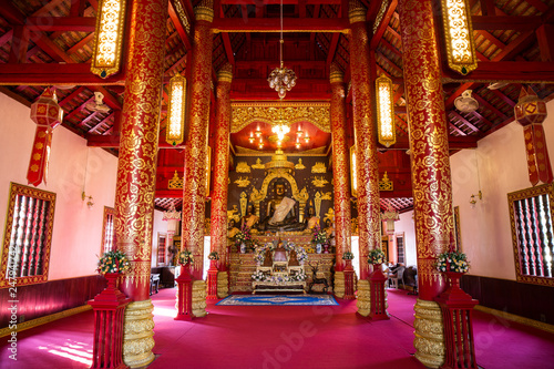 Interior of Thai Northern Temple and Buddha Sculpture at Wat Phra Kaeo - Chiang Rai, Thailand