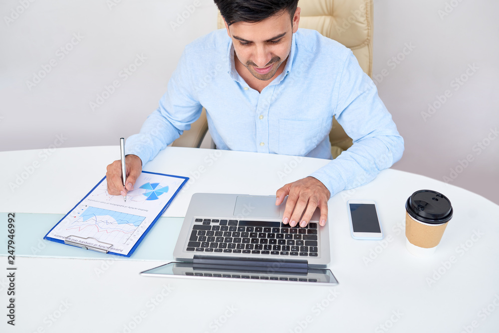 Businessman working on financial report
