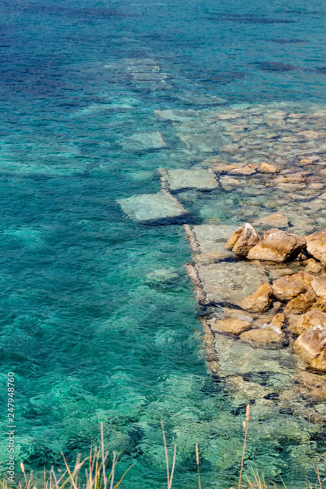 The old sunken bridge. Adriatic Sea. Montenegro. The island of Saint Nicholas