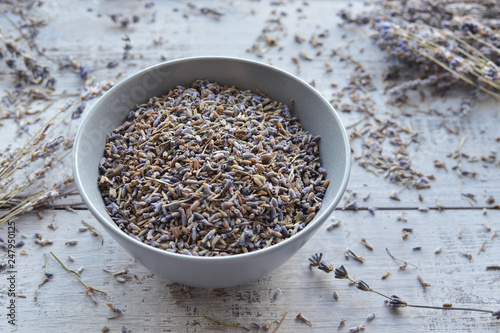 natural dry lavender flowers tea in ceramic bowl