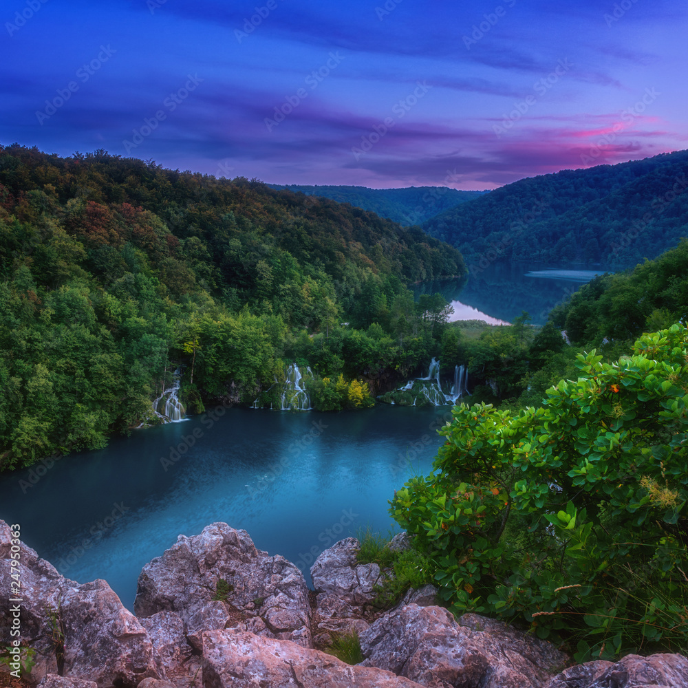 Amazing nature, scenic landscape at twilight from popular viewpoint in  Plitvice Lakes National park, Top view of waterfalls and lakes surrounded by forests, Croatia