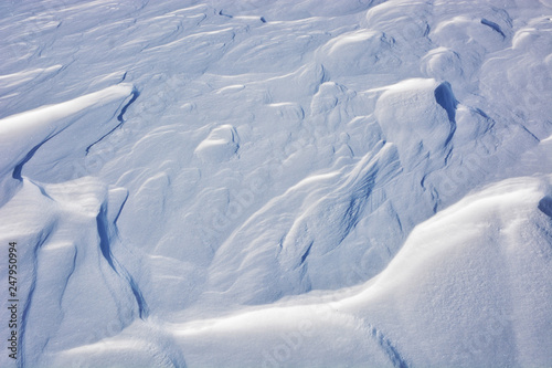Close up background of fresh snow texture.