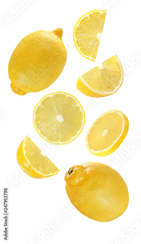 Lemon falling, hanging, flying whole and half piece of fruits isolated on white background with clipping path.