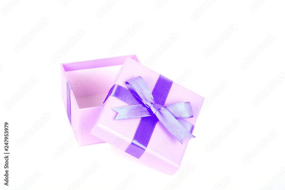 gift box with purple bow and white background gift box with purple bow and white background