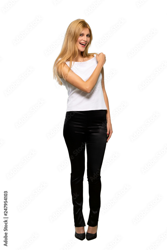 Young blonde woman smiling a lot over isolated white background Young blonde woman smiling a lot over isolated white background
