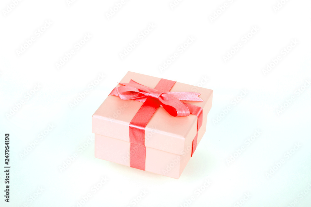 gift box with red bow and white background gift box with red bow and white background