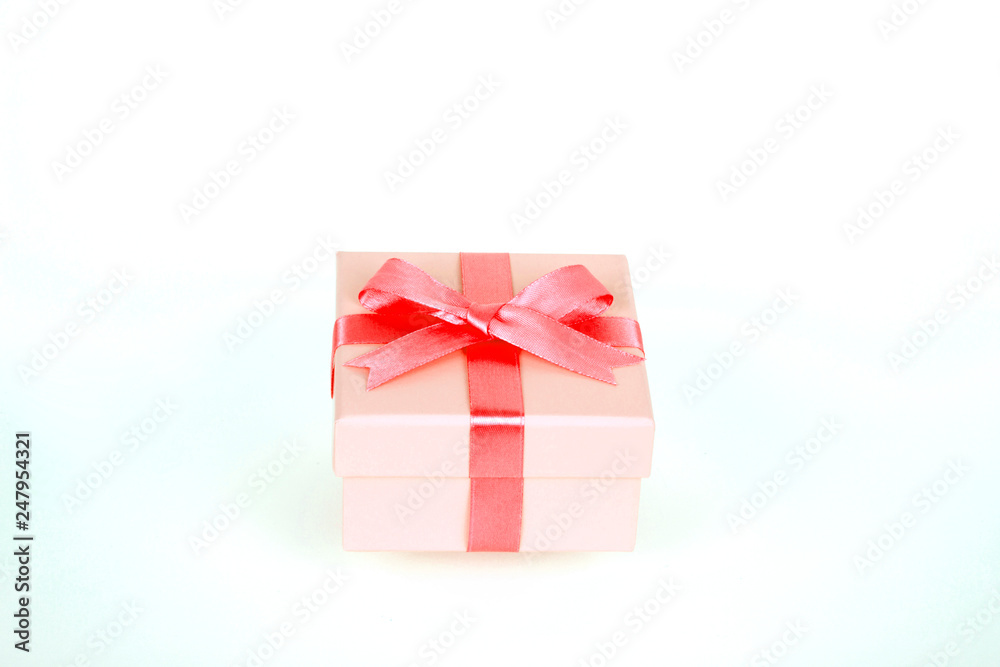 gift box with red bow and white background