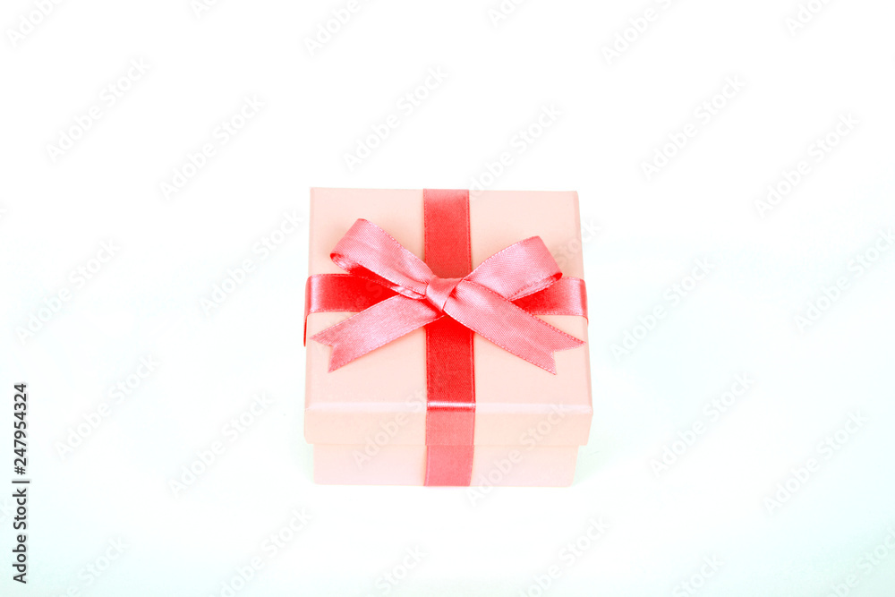 gift box with red bow and white background
