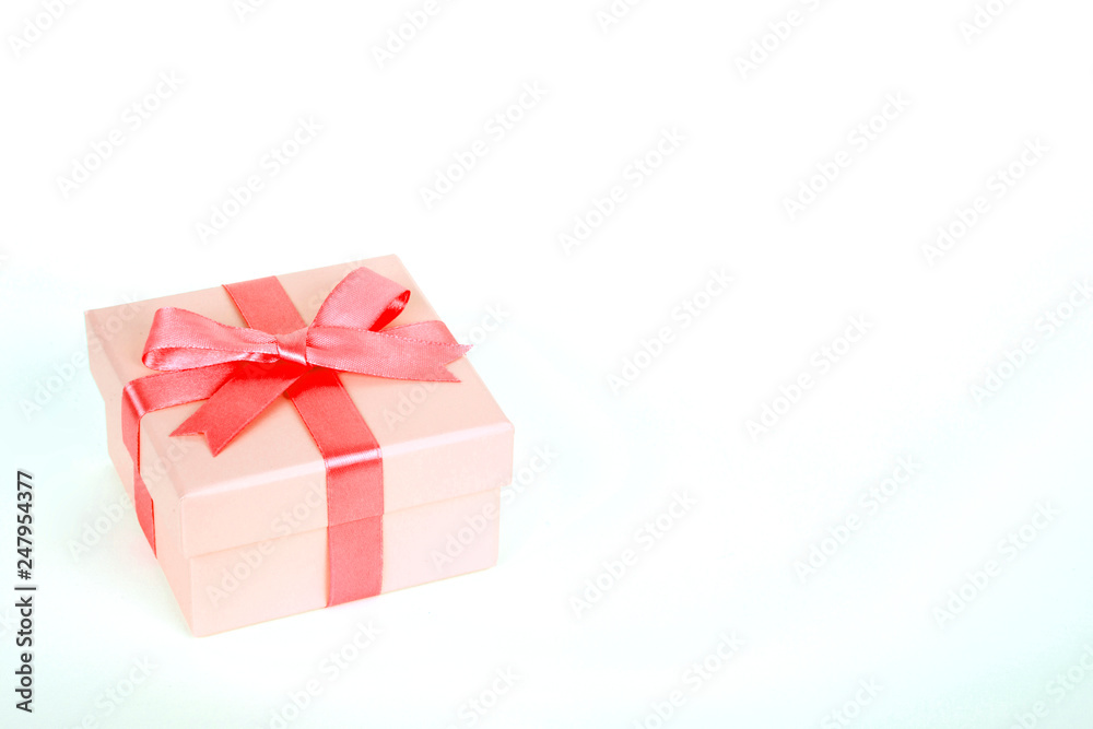 Obraz premium gift box with red bow and white background