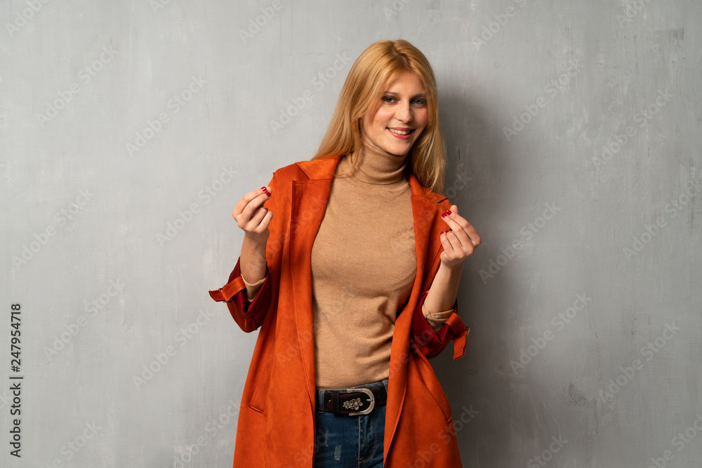 Woman over textured background keeping a conversation with the mobile phone Woman over textured background keeping a conversation with the mobile phone