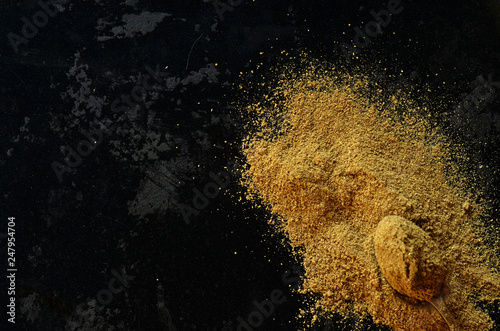 Curry powder on a black background