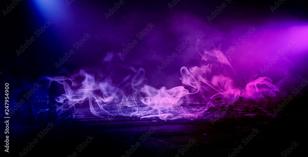 Fototapeta premium Background of an empty dark room. Empty walls, neon light, smoke, smog. Blue and pink smoke, ultraviolet light in the dark.