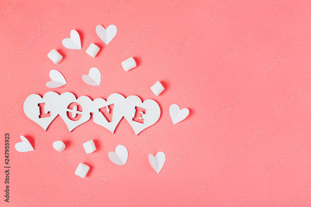 Love word and hearts, flat lay on pink background, copy space
