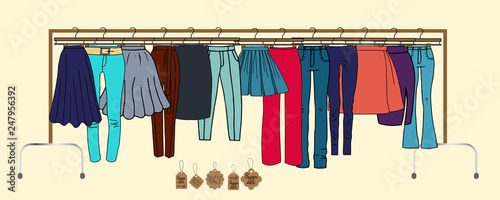 Vector illustration of clothes on hangers - skirts, pants. Also presented shoes.