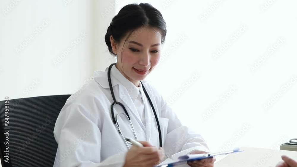 Medical professionals woman reassuring and talking with patient. Medical professionals woman reassuring and talking with patient.