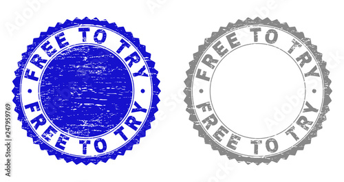 Grunge FREE TO TRY stamp seals isolated on a white background. Rosette seals with grunge texture in blue and gray colors. Vector rubber stamp imprint of FREE TO TRY title inside round rosette.