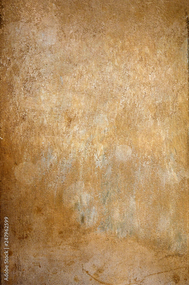 Fototapeta premium The wall of the old house. Cracks on the surface. Background