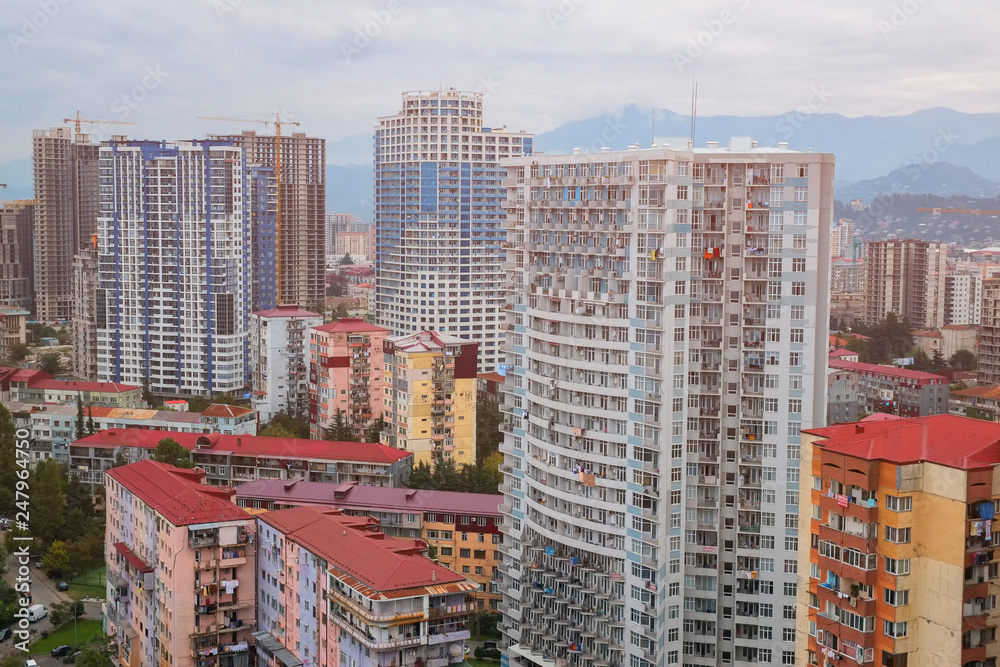 Naklejka premium Architecture of Batumi. Modern skyscrapers and skyline. View of the city under construction.
