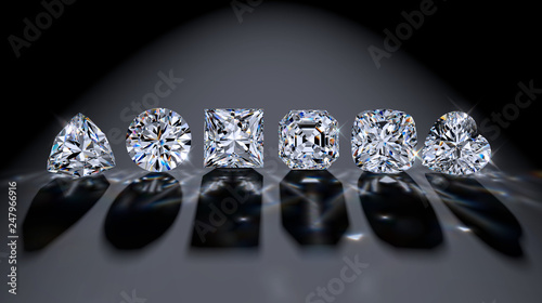 Six popular diamond cuts lined up in a spotlight on dark gray background photo