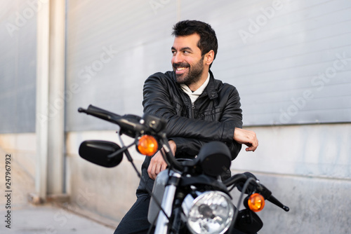 Young man on a motorbike © luismolinero