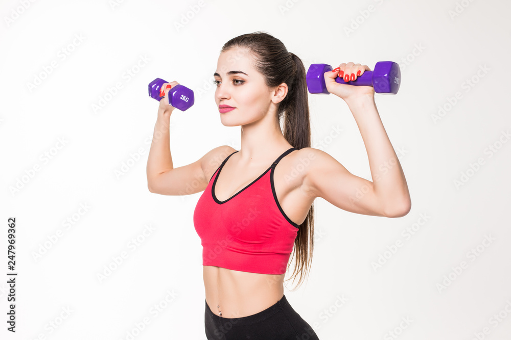 Portrait of pretty sporty girl holding weights isolated on white background Portrait of pretty sporty girl holding weights isolated on white background