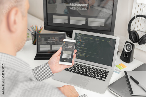 Photos Web designer, programmer working with template