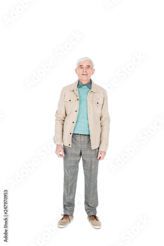 happy senior man smiling while standing isolated on white