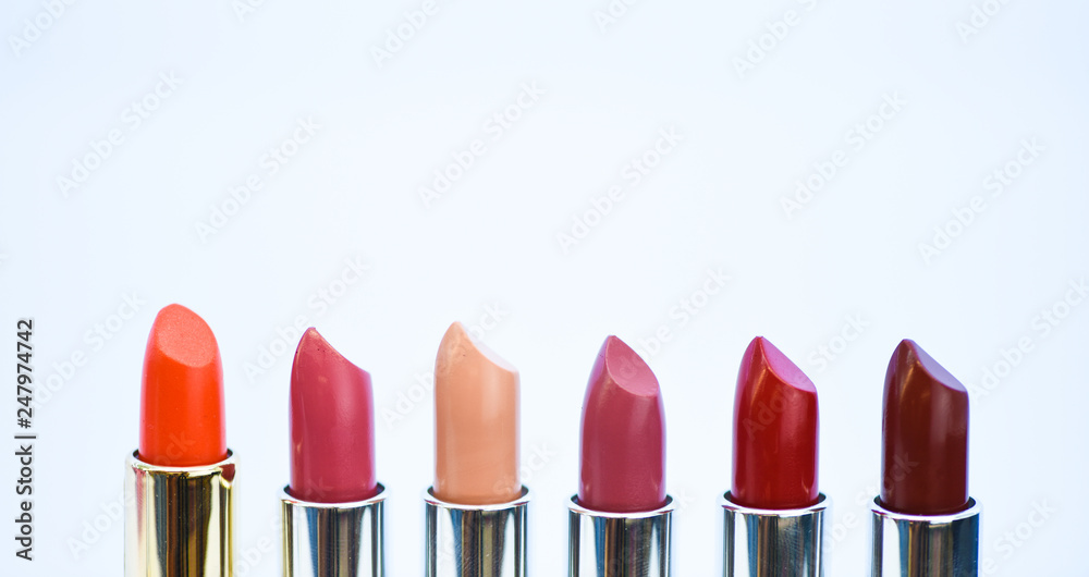 Daily make up. High quality lipstick. Cosmetics artistry. Lipstick for professional make up. Pick color which suits you. Compare makeup products. Lip care concept. Lipsticks on white background