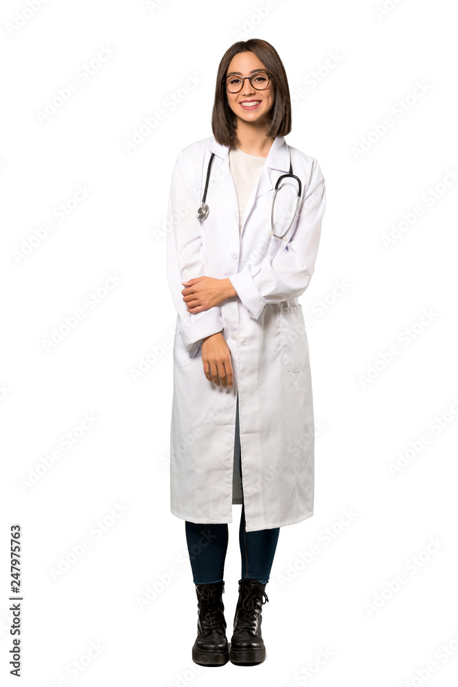 A full-length shot of a Young doctor woman with glasses and happy over isolated white background A full-length shot of a Young doctor woman with glasses and happy over isolated white background