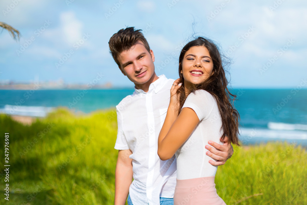 Happy young couple at outdoors Happy young couple at outdoors