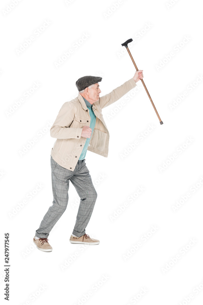 senior man holding walking stick above head isolated on white senior man holding walking stick above head isolated on white
