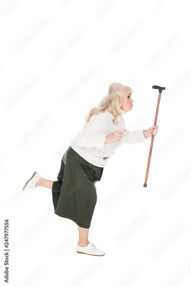 senior woman running with walking cane isolated on white senior woman running with walking cane isolated on white