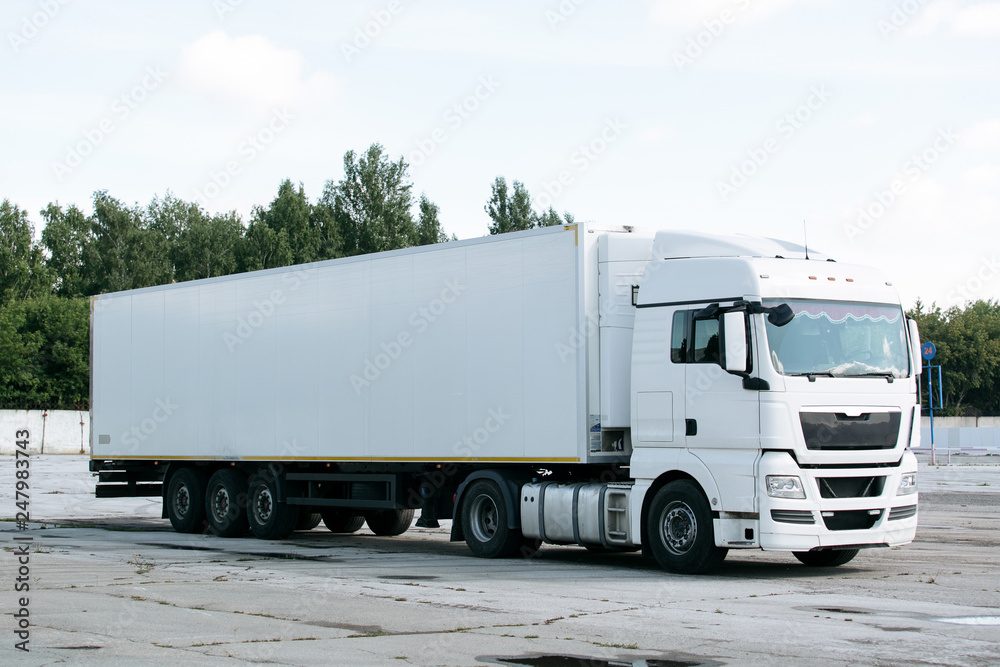 white truck with trailer