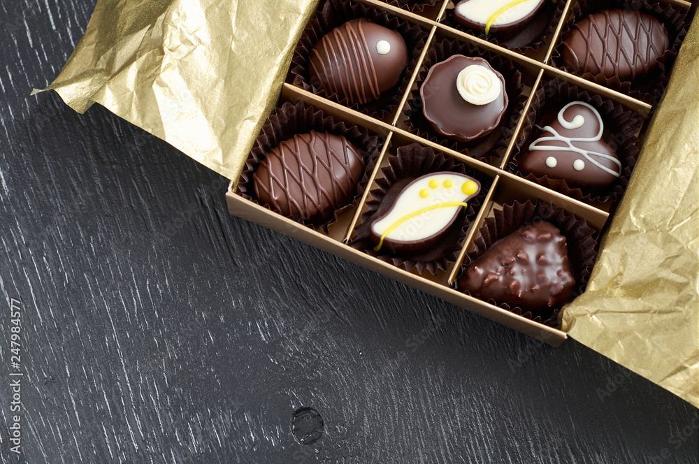 Artisan handcrafted chocolate bonbons packaged in a gift box