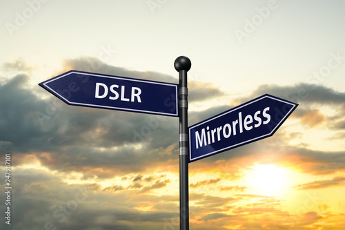 arrow road signs of words dslr and mirrorless on the sunset sky. 3D illustration  photo