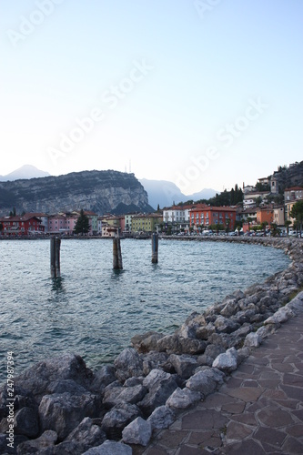 Evening walk. Picturesque lake Garda