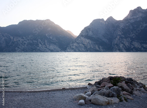 Evening walk. Picturesque lake Garda