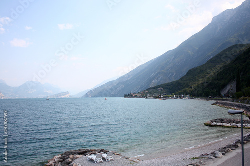 Evening walk. Picturesque lake Garda