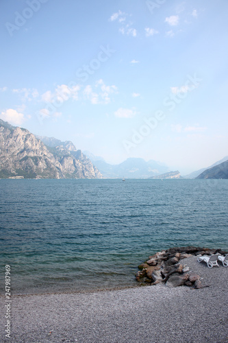 Evening walk. Picturesque lake Garda