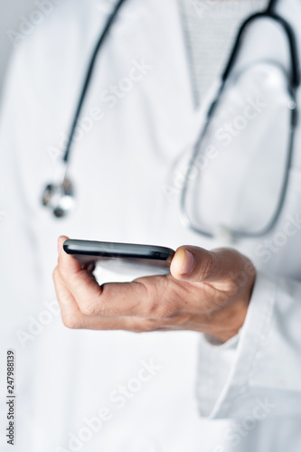 doctor man using a smartphone