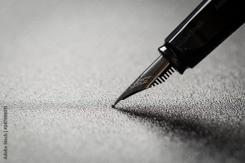 Fototapeta premium Fountain pen with clipping path on black background