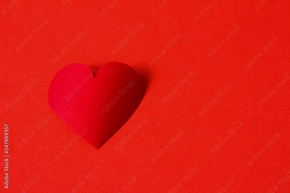 Valentine concept, perfect for card or banner - 3d red heart on the pink background, selective focus, free copy space