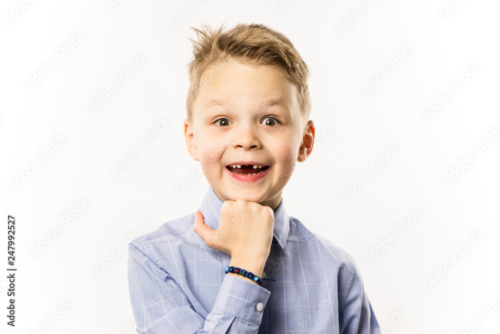 happy funny cute boy without front teeth showing hand gesture happy funny cute boy without front teeth showing hand gesture