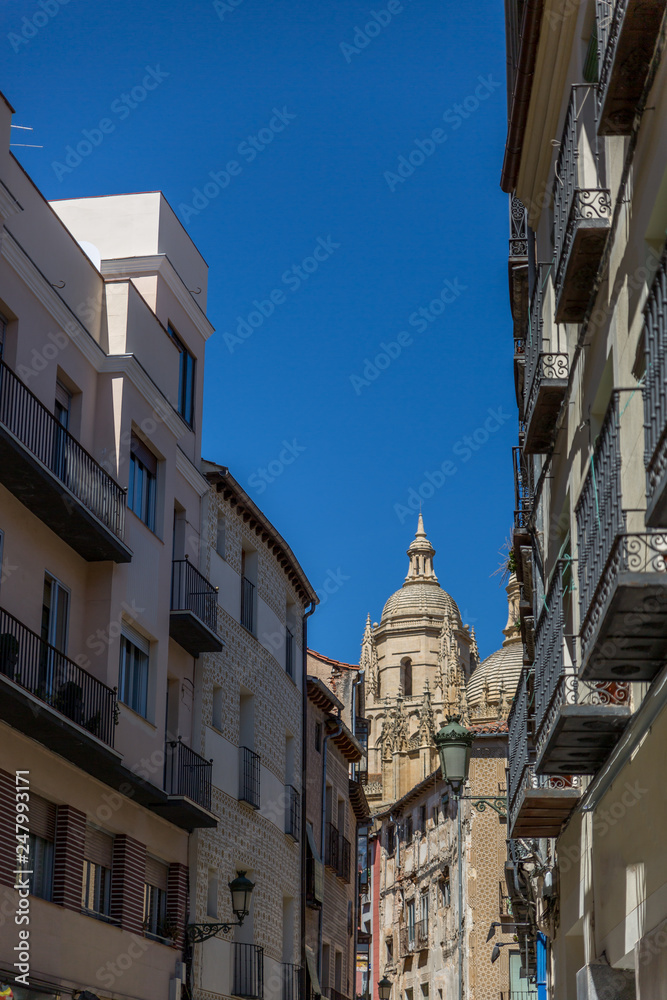 Naklejka premium Typical architecture of a downtown street in the old city of Segovia